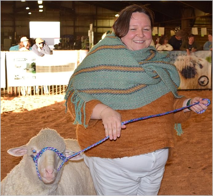 Angelia models this year�s winning shawl from Team Fascinators. Photo: Peggy Lundquist.
